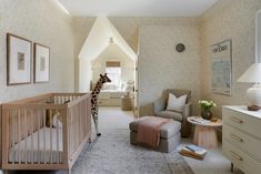 a baby's room with a giraffe in the crib and furniture