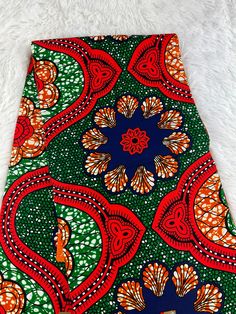 This Multicolor African Fabric is high quality African print made from 100% cotton and it's 45 inches wide. It is used for making African Clothing, African quilts, & For Home decoration. FYI: Print is Double sided. The listing is for 1, 6 yards and Headwrap Each piece of fabric measures:  36in by 45in for 1 yard 216in by 45in for 6 yards 70in by 22in for Head wrap If you purchase more than one yard, you will receive one continuous piece. *If you require more than what I have listed, feel free to send me email. CARE INSTRUCTIONS: *DO NOT BLEACH *Hand wash with cold water and mild soap or Dry clean *Press with hot iron for a crispy look. Color may be different due to your monitor Cotton Fabric With Vibrant Multicolor Print, Multicolor Cotton Fabric With Vibrant Print, Colorful Cotton Digital Prints, Vibrant Multicolor Cotton Fabric, Vibrant Print Patterned Cotton Fabric, Vibrant Print Cotton Fabric, Cotton Fabric With Vibrant Patterned Print, Patterned Cotton Fabric With Vibrant Print, Green Traditional Fabric With Colorful Pattern