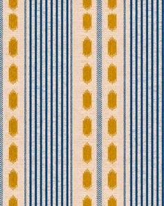 a blue and yellow striped wallpaper with small dots on the bottom half of it