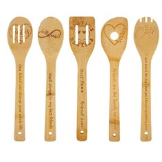 four wooden spoons with engraved names and hearts on them, all lined up in a row