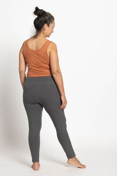 Our new and improved Hemp Leggings are here! With flatlock stitching to reinforce the seams and an added gusset, these will last even longer with regular wear & use. The hemp fabric adds antibacterial and antimicrobial properties, so your leggings won't hold onto odors like 100% cotton. **Please note: our leggings run 1-2 sizes smaller than our yoga shorts/bike shorts. Our new and improved Hemp Leggings also fit differently than our previous style. Please check the size chart below before orderi Solid Color Cotton Yoga Leggings, Fitted Activewear For Yoga With Tapered Leg, Versatile Yoga Pants With Tapered Leg, Everyday Stretch Full-length Sweatpants, Solid Tapered Leg Yoga Activewear, Full Length Tight Activewear For Everyday, Casual Solid Midweight Leggings, Comfortable Casual Yoga Bottoms, Yoga Cotton Leggings With Elastic Waistband