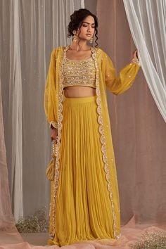 Shop for these amazing collections of Yellow Silk Embroidered Sequins Round Bead Jacket Lehenga Set For Women by Nidhika Shekhar online at Aza Fashions. Organza Cape, Jacket Lehenga, Haldi Dress, Haldi Outfits, Haldi Outfit, Georgette Lehenga, Yellow Lehenga, Long Cape, Beaded Jacket