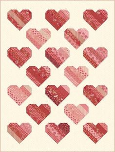 many hearts are arranged in the shape of heart shapes on a white background with pink and red