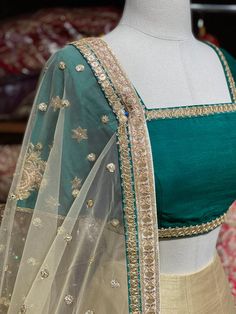 Alabaster white lehenga paired with teal green blouse and net sequence dupatta. Fabric: Raw Silk This outfit can be customized in multiple colors and specific to client measurements. 90 days of production time is required and are for bulk orders only! Orders are processed in store only! Final fittings/alterations not included. Minimum Order Quantity- 4 pieces White Lehenga With Green Dupatta, Green Raw Silk Lehenga With Unstitched Blouse, White Raw Silk Lehenga With Unstitched Blouse, Wedding Green Blouse Piece With Sheer Dupatta, Green And White Lehenga, Luxury Green Slub Silk Lehenga, Teal Green Blouse, Bridesmaids Lehenga, Bridesmaid Lehenga