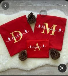 three personalized christmas towels with pine cones