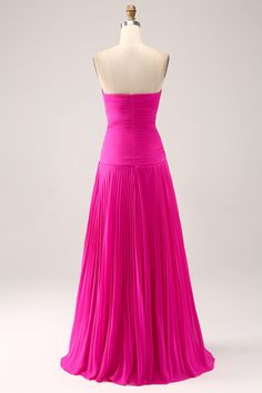 a bright pink dress on a mannequin