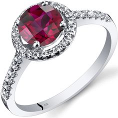 Raspberry kisses For the romantic in all of us. Our raspberry kissed rubies will leave you feeling adored. This classic ring features a round shape Peora created Ruby gemstone in 14K white gold. Responsibly sourced in every sense, our created Ruby gemstones are physically, chemically, and optically identical to their natural counterparts. We're big fans of eco-luxury. Handcrafted in pure 14K white gold goodness, this ring has been carefully coated in an elegant rhodium finish. Our artisans are expertly trained in this process which fortifies the ring's strength, shine and brilliance. Looking for an anniversary or engagement present? Our concierge stylists are here to help with all of your jewelry questions. Each purchase comes beautifully packed in one of our signature gift boxes, because Jewelry Questions, Ringe Gold, Garnet Jewelry, Ruby Jewelry, Garnet Rings, Garnet Gemstone, Classic Ring, Halo Ring, Red Garnet