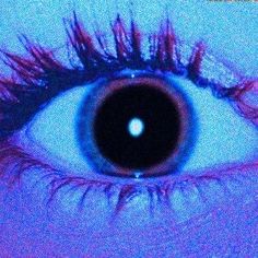 an eye with purple and blue colors is shown in this image, it looks like the iris