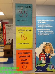 there are many signs on the wall in this school hallway that say every minute counts for student success