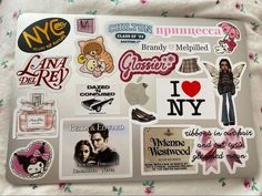 a laptop with many stickers on it