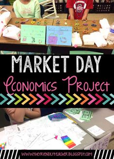 two children sitting at a table in front of a sign that says market day economic project