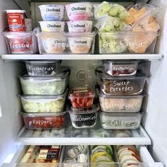 an open refrigerator filled with lots of food and condiments to choose from in containers