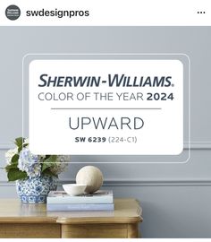 the sherwin - williams color of the year award is displayed on a table