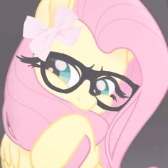 a pink pony with glasses and a bow on it's head