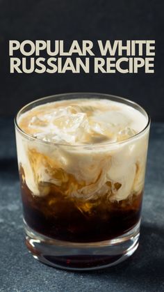 a close up of a drink in a glass on a table with the words popular white russian recipe