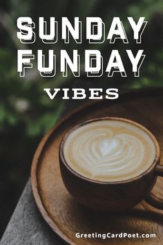 a cup of coffee sitting on top of a wooden plate with the words sunday funday vibe