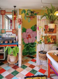 a colorful bathroom decorated with plants and decor