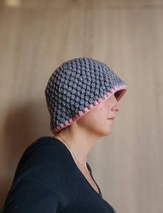 Woman  winter  bucket hat, crocheted hat, made with soft yarn 25 % wool and 75% acrylic. Gray bucket hat with pink periphery. Soft hat, great gift for you or for girlfriend. Size : US 6 5/8- 6 3/4;  S Head diameter 53 -55 cm. Model head diameter is 53 cm. Winter Hand Knitted Brimmed Bucket Hat, Hand Knitted Brimmed Bucket Hat For Winter, Winter Crochet Bucket Hat With Curved Brim, Hand Knitted Yarn Bucket Hat For Winter, Handmade Pink Winter Bucket Hat, Handmade Gray Crochet Hat For Winter, Winter Crochet Cloche Hat, Gray Handmade Yarn Hats, Gray Crochet Hat One Size Fits Most