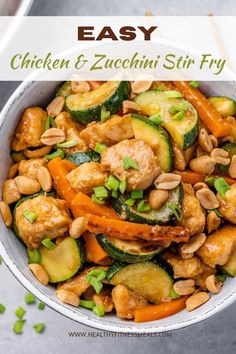 chicken and zucchini stir fry with cashews in a bowl