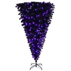 a purple christmas tree with lights on it's top and bottom branches in the shape of an upside down cone