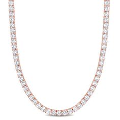 Dazzle with glory with this Created White Sapphire Tennis Necklace. Crafted in rose plated sterling silver, this shining necklace features 103 round-cut created white sapphire gemstones (4x4mm) in a tennis pattern for a regal look. This adjustable necklace measures 17-inches in length along with a 3-inch extension, secures with a lobster clasp and is perfect for layering with other necklaces. Enhanced with a high polished finish, this gift worthy necklace is a sparkling addition to any jewelry c Rose Gold Tennis Necklace With Diamond Accents, Rose Gold Round Tennis Necklace As A Gift, Rose Gold Diamond Tennis Necklace With Accents, Rose Gold Diamond Tennis Necklace For Anniversary, Rose Gold Brilliant Cut Tennis Necklace For Anniversary, Anniversary Rose Gold Diamond Tennis Necklace, Anniversary Rose Gold Brilliant Cut Tennis Necklace, Rose Gold Fine Jewelry Tennis Necklace, Rose Gold Round Tennis Necklace