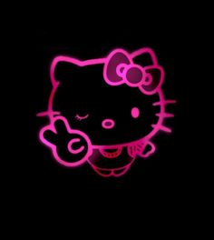 a neon hello kitty wallpaper in the dark