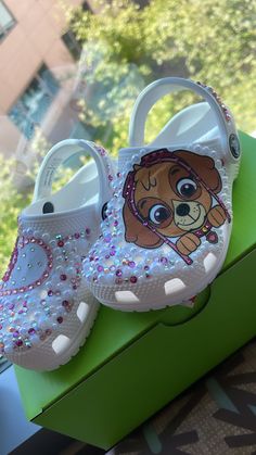 These are custom made to order Crocs made with high quality crystals and Swarovski  crystals  You can view a video of the shoes on Instagram: https://www.instagram.com/spriinklesofjoy Any character can be done Convo me with questions regarding your preferred Character/Theme.  These shoes are perfect for birthday outfits or everyday wear. With these shoes your little one is sure to stand out! Shoes are MADE TO ORDER it will take 1 week it does not include shipping time. If you need them sooner, Bling Crocs, Puppy Girl, Paw Patrol Skye, Custom Crocs, Girls Shoes Sneakers, Birthday Outfits, Girls Sneakers, Sneakers Athletic, Paw Patrol