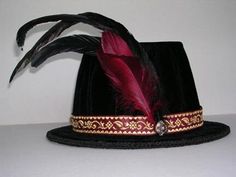 "A classic Renaissance hat worn by men and women of the noble class.  A 6-8\" tall hat constructed of buckram with a small wired brim.  It can be covered in a variety of fabrics and accessorized with feathers to compliment your wardrobe. Creation time is 4-6 weeks." Curved Brim Top Hat For Kentucky Derby Costume, Elegant Ceremonial Hat With Curved Brim, Elegant Ceremonial Hat With Short Brim, Formal Brimmed Hat With Feathers, Elegant Costume Top Hat With Short Brim, Elegant Top Hat With Short Brim For Costume, Elegant Short Brim Top Hat For Costume, Adjustable Ceremonial Costume Hat With Curved Brim, Formal Costume Hats And Headpieces With Feather Trim