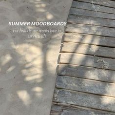 a wooden walkway with the words summer moodboards on it