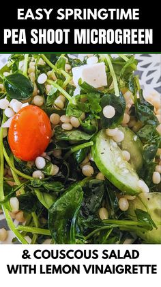 a salad with spinach, cucumber and tomatoes on it is featured in the cover of easy springtime pea shoot microgreen