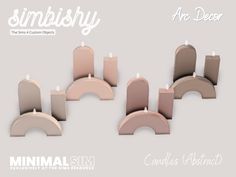 candles are arranged in the shape of archs with words simlishy and no decor