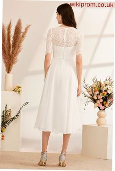 Wedding Dresses A-Line Beading Deja Wedding Tea-Length With Dress Silhouette:: A-Line Length:: Tea-Length Fabric:: Chiffon,Lace Embellishment:: Beading BackStyle:: ZipperUp FullyLined:: NO Built-InBra:: Yes Boning:: Yes Size:: General,Plus Season:: Winter,Fall WeddingVenues:: Beach,Garden/Outdoor This dress could be custom made, there are no extra cost to do custom size and color. Short Sleeve Lace Bodice Mother Of The Bride Dress, White A-line Tea Length Wedding Dress, White Bridesmaid Dress With Lace Bodice For Wedding, White Lace Bodice Bridesmaid Dress For Wedding, White Lace Bridesmaid Dress For Wedding, White Floor-length Dress For Wedding Reception, Elegant Beach Wedding Dress With Lace Bodice, Elegant Lace Bodice Dress For Beach Wedding, Fitted White Tea Length Wedding Dress