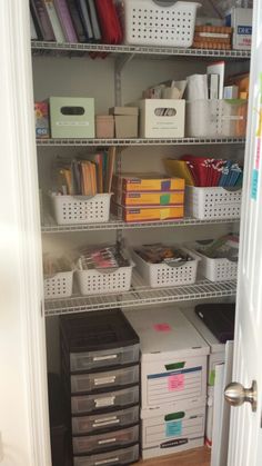 an organized pantry with bins and baskets