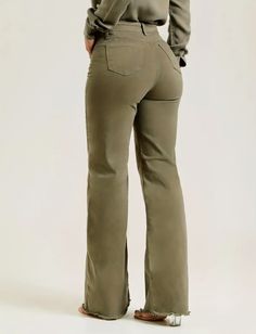 These pants are a stylish pair of mid-waisted jeans in an earthy olive green color. They feature a classic design with a modern twist, making them a versatile addition to any wardrobe. These pants are tailored to provide a flattering fit, with a high-rise waist that accentuates the wearer's natural waistline, creating a sleek and elongated silhouette. The front of the pants includes a traditional button and zipper closure, adding to their classic appeal. The trousers are equipped with functional High Rise Stretch Khaki Pants, Chic Olive High Waist Bottoms, Green Stretch Wide Leg Jeans, Khaki High Rise Stretch Pants, Chic Olive Straight Leg Bottoms, Khaki Stretch Mid-rise Bottoms, Mid-rise Khaki Jeans For Fall, Khaki High Waist Stretch Jeans, Fitted Green Wide-leg Jeans