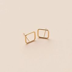 Add this square earring to your family of dainty geometric earrings. Theses are the minimalist stud earrings. Minimal and geometric. Beautiful on their own or perfect to mix and match.Details:Location: EarlobeStyle: Minimalist/DaintyMade with: 14K Gold FilledBacks: Classic Butterfly Minimalist Stud Earrings, Earrings Minimal, Minimalist Earrings Studs, Minimalist Studs, The Minimalist, Square Earrings, Geometric Earrings, Mix And Match, Post Earrings