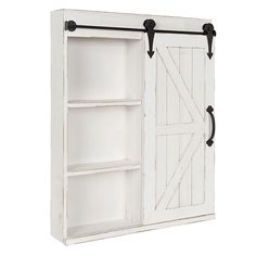 a white cabinet with two open doors and black handles