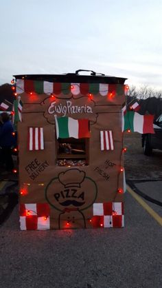 a food truck decorated with lights and decorations