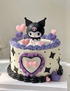 a cake decorated with an image of a cat