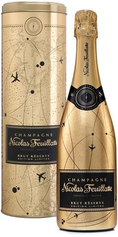 a bottle of champagne next to a box