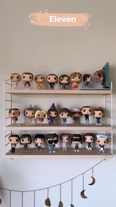 the shelves are filled with many different pop - up figures, including eleven harry potters