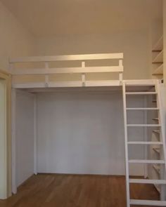 an empty room with a ladder to the ceiling and a white loft bed above it