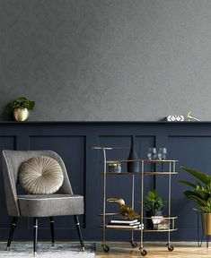 a living room with blue walls and two chairs in front of a shelf filled with plants