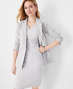 Elevate your wardrobe with the Ann Taylor Double V Seamed Sheath Dress, a testament to sophisticated styling and comfort. This dress features a unique double V-neck at the front and back, enhancing its elegant silhouette. 

- Size: 18 Regular
- Color: Pebble Grey Melange
- Gender: Female
- Material: 66% Polyester, 28% Rayon, 6% Spandex; Lining: 100% Polyester
- Length: 25" from natural waist
- Fit: Tailored fit
- Care: Machine washable

Crafted in a bi-stretch fabric that maintains its shape whi Ann Taylor Work Outfits, Zara Work Outfits Women, Professional Dresses Women, Flight Attendant Interview Outfit, Courtroom Attire Women, Women Suit Outfits, Sheath Dress Outfit, Professional Fits, Young Professional Outfits