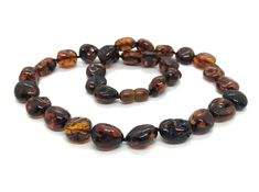 Baltic Amber Necklace  With clasp Material: 100% Natural Baltic Amber Amber with natural IMPERFECTIONS Comes from Baltic sea region Beads size approx: 11-12 mm (0.43-0.47 inch) Length: 45 cm (17.71 inch)  Weight: 25,2 gr. (0.88 oz) Handmade jewelry   Is this one not for You?              Then Click here to see my other items!       Have any questions regarding the item?  Please feel free to contact us through eBay messages!      Have any problems regarding your purchase? Please contact us and we guarantee to solve it!    Have already bought the item? Thank You! Your package will be shipped in 1 day after payment receiving   Is your location far away from Lithuania? Not a problem! We ship WORLDWIDE, registered priority air mail with tracking number, can take up to 7- 45 working days.   Do Y Artisan Jewelry Necklaces, Baltic Amber Necklace, Jewelry Knots, Stone Beaded Necklace, Unisex Necklace, Natural Amber, Handcrafted Artisan Jewelry, Amber Necklace, Amber Beads