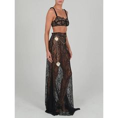 Discover Elegance and Style with Our Lace Two-Piece Skirt Set Introducing a stunning ensemble that blends sophistication with a touch of allure - our Sheath Crop Top and Maxi Skirt Set. Designed for the modern woman who loves to make a statement, this set is perfect for elegant parties, beach outings, and any event where you want to stand out. The intricate lace design and floor-length skirt exude a sense of luxury and fashion-forward style. Product Features Silhouette: Sheath design that accentuates your figure. Material Composition: Made from a blend of high-quality natural fibers for comfort and durability. Seasonal Versatility: Ideal for Autumn and Winter, offering both warmth and style. Pattern and Style: Features a unique print pattern, perfect for those who love to make a bold fashi Long Lace Skirt For Evening, Long Lace Evening Skirt, Evening Long Lace Skirt, Elegant Two-piece Skirt, Fitted Black Set For Gala, Fitted Black Sets For Gala, Black Fitted Sets For Gala, Long Lace Skirt For Party, Elegant Fitted Floor-length Skirt Set