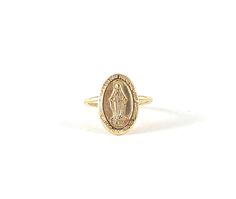 This Miraculous Medal ring an excellent addition to your growing fine jewelry collection. Made in solid 10k yellow gold, it is guaranteed to last a lifetime (and beyond).   Medal dimension: 1.10 x 1.60cm. Band measurement: 1.30mm round wire The band is slightly offset from the center of the pendant, as there is beautiful detail on the back side of the pendant, and I wanted to maintain the integrity of the design. The pendant is made in Italy.  It is fabricated into a ring in our Vancouver-based Virgin Mary Ring, Divine Mother, Mother Rings, Signet Rings, Solid Gold Ring, Miraculous Medal, Solid Gold Rings, Mother Mary, Fine Jewelry Collection