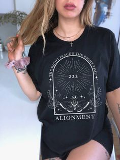 Be in alignment with this beautiful 222 angel number shirt! Want a different design or color? Just let us know and we'll make it happen! FIT & SIZING: * These soft and lightweight Bella-Canvas unisex t-shirts have just the right amount of stretch, and are made in the USA. * Tees are comfortable and flattering for both men and women. * Please see the size chart in the photos to obtain an accurate size. Measure one of your favorite tees for comparison! * Ladies: These tees are unisex sizes. Your n Moon Sweatshirt, Celestial Shirt, Academia Clothing, Literary Shirts, Bee Shirt, Poet Shirt, Dark Academia Clothing, Spiritual Shirts, Number Shirt