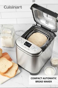 an image of bread in the toaster on the kitchen counter with text that reads compact automatic bread maker