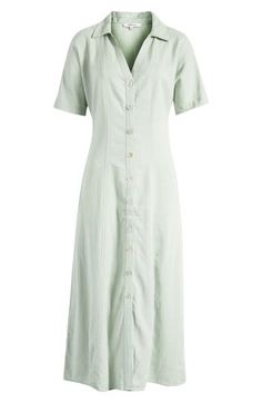 Coming in an airy linen woven with Lenzing™ EcoVero™ viscose, this shirtdress has a point collar and oversized short sleeves. Designed with a body-skimming fit, this midi has buttons along the front for easy on-and-off. 50 1/2" length (size 8) Front button closure Point collar Short sleeves Unlined 55% linen, 45% Lenzing™ EcoVero™ viscose Lenzing™ EcoVero™ viscose is a sustainably produced fiber using pulp made from renewable wood sources and certified with the EU Ecolabel for high environmental Summer Shirt Dress With Spread Collar, Summer Shirt Dress With Spread Collar And Placket, Short Sleeve Shirt Dress With Placket For Beach, Summer Viscose Knee-length Shirt Dress, Summer Knee-length Viscose Shirt Dress, Chic Short Sleeve Viscose Shirt Dress, Viscose Knee-length Shirt Dress For Summer, Summer Rayon Button-up Shirt Dress, Knee-length Viscose Shirt Dress For Summer