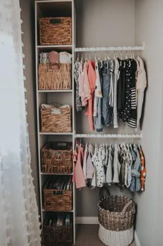 an organized closet with clothes and baskets